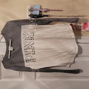 Victoria secret long sleeve tee with bling lettering and detailed sleeves. Small